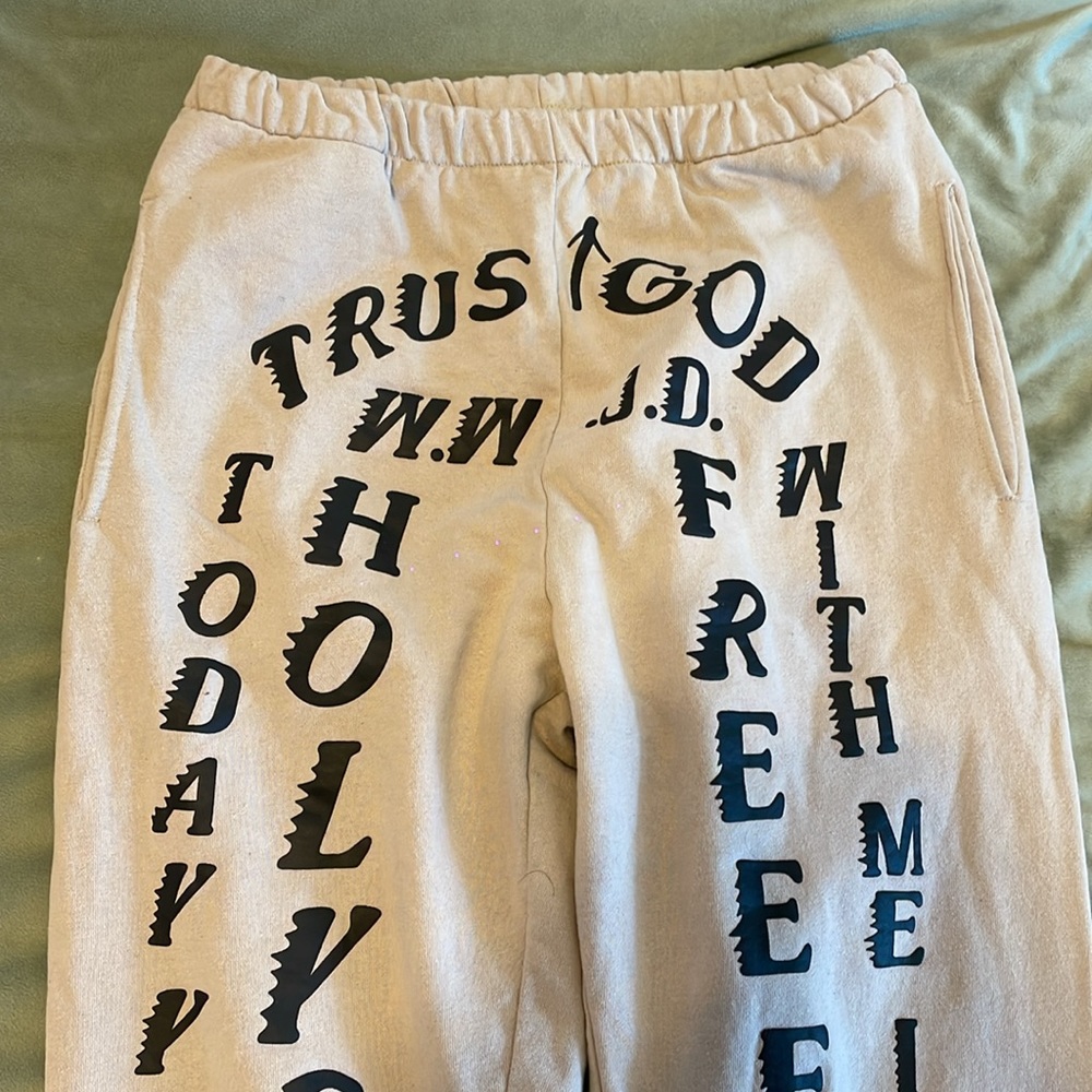 Kanye west trust god sweatpants.